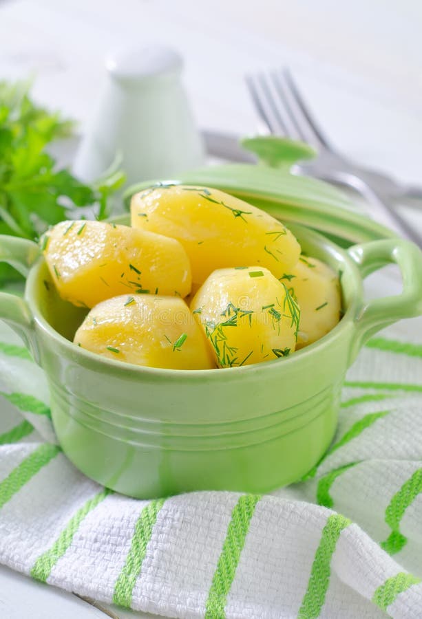 Boiled potato in green bowl. Boiled potato in green bowl