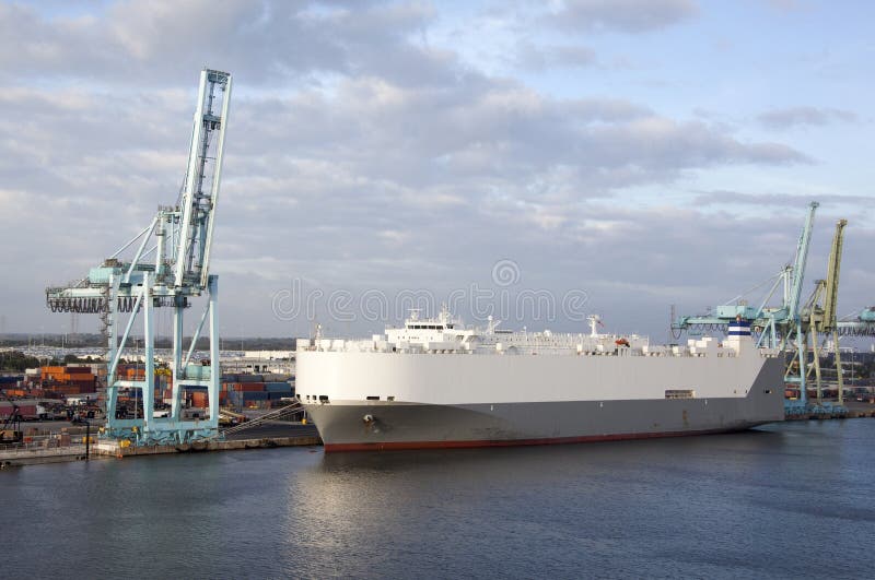 The cargo ship moored in Jacksonville city port in Saint Johns River Florida. The cargo ship moored in Jacksonville city port in Saint Johns River Florida.