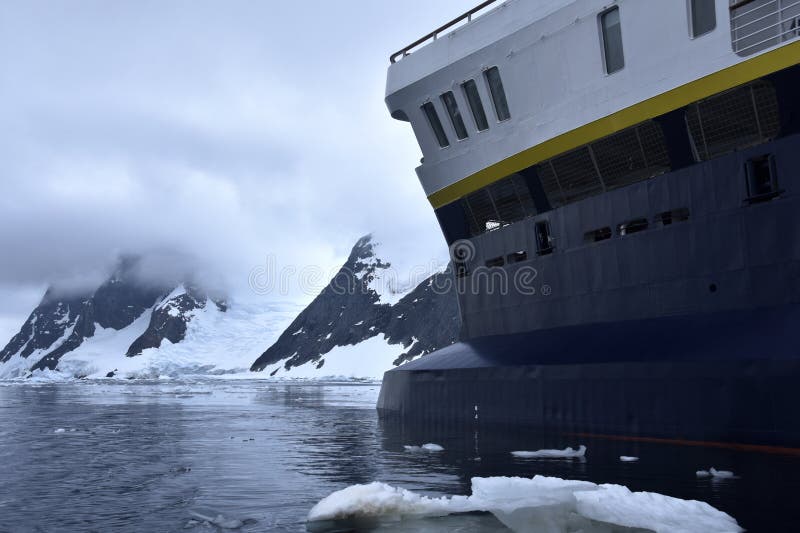 Cruise ship navigating on icy waters. Cruise ship navigating on icy waters