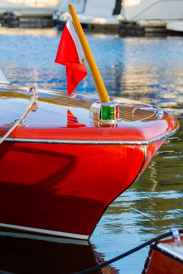 Vintage wooden boat moored at dock. Vintage wooden boat moored at dock