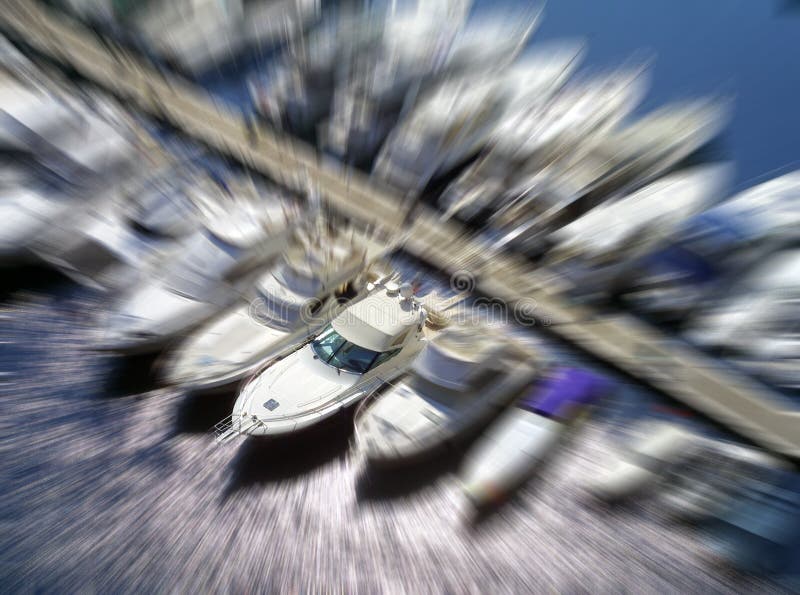 Aerial view of boats moored on Monaco jetty with zoom effect. Aerial view of boats moored on Monaco jetty with zoom effect