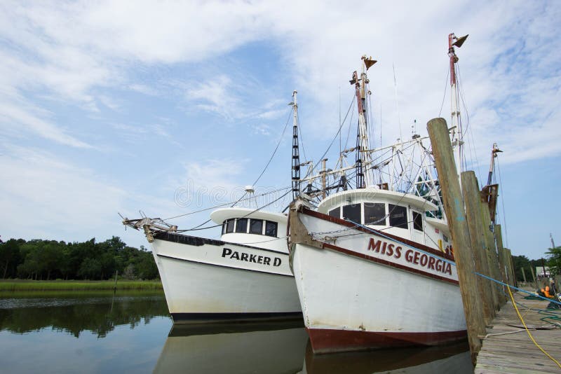 A pair of shrimp boats in the McClellanville Harbor, South Carolina. A pair of shrimp boats in the McClellanville Harbor, South Carolina