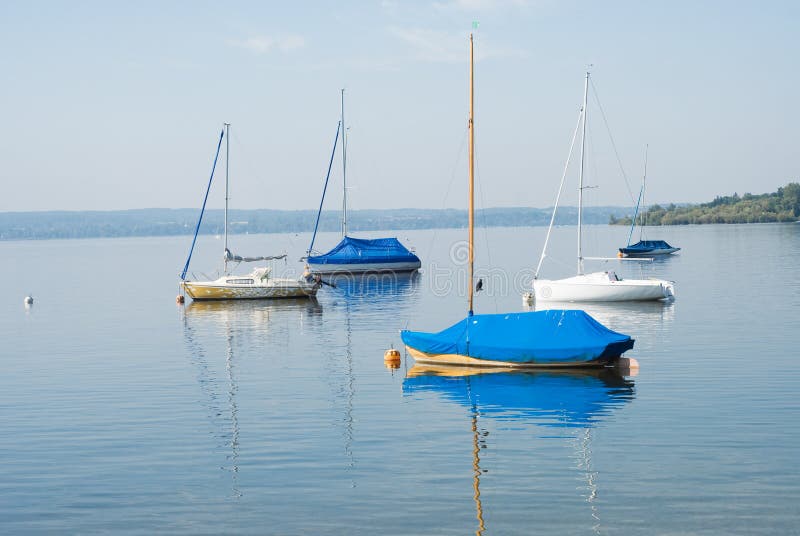 Moored Sailboats on a Calm Bavarian Lake. Moored Sailboats on a Calm Bavarian Lake