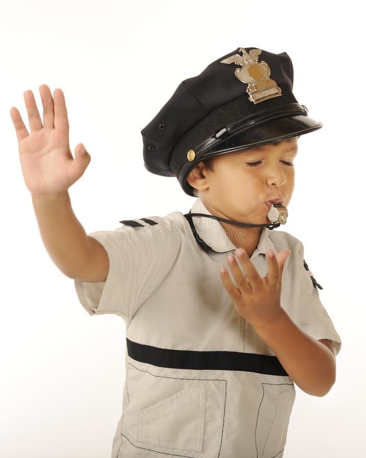 An adorable preschooler gesturing stop, while wearing the police hat and blowing a whistle. Isolated. An adorable preschooler gesturing stop, while wearing the police hat and blowing a whistle. Isolated.