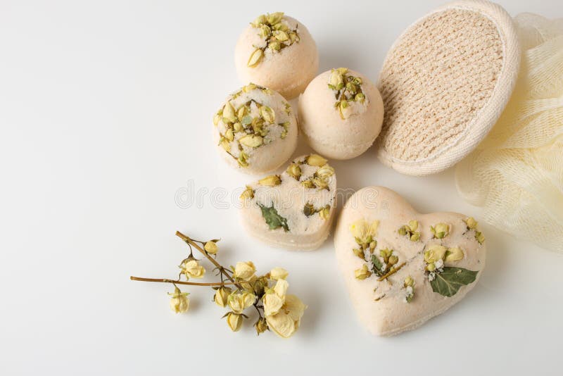 Bath Bombs Decorated with Dried Linden Flowers on a White Stock Photo