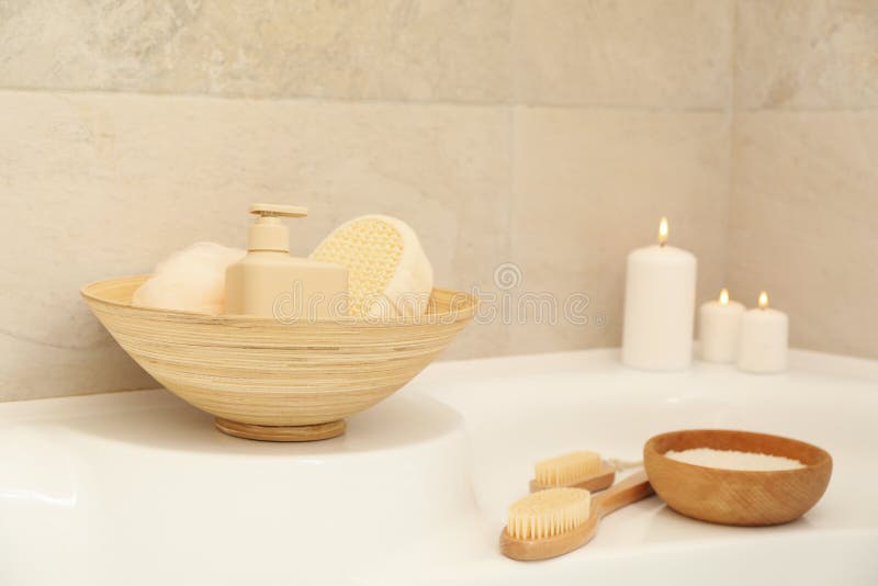 Bath with Personal Hygiene Accessories in Light Beige Bathroom Stock