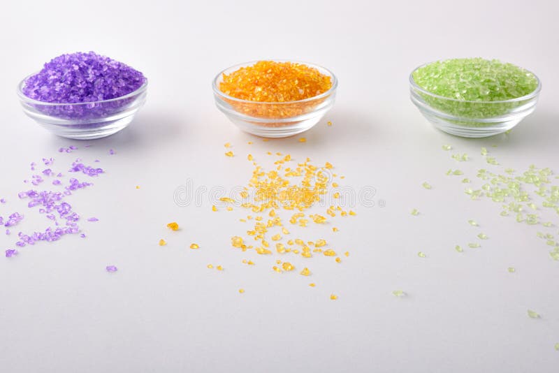 Bath Salts in Containers on White Table Elevated View Stock Image