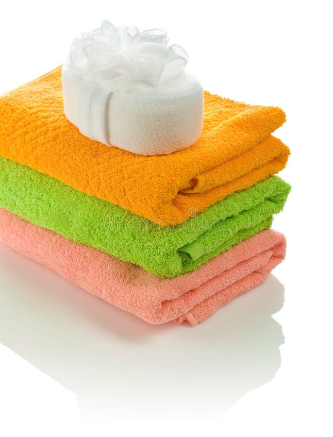 Bath sponge on towels