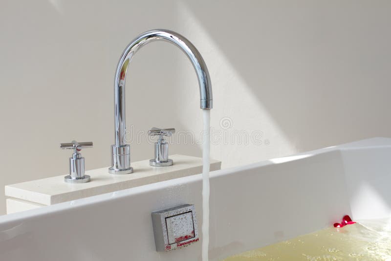 Bath tub and faucet royalty free stock photo Bath tub and faucet royalty free stock photo