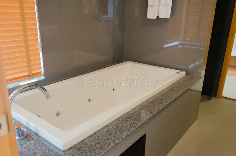 Bath tub in hotel stock image. Image of relaxation, clean 98666689