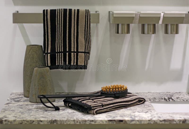 Bathroom accessories, brush and towel on to