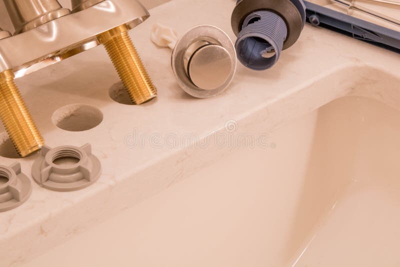 Bathroom Faucet And Drain Ready For Installation Stock Photo
