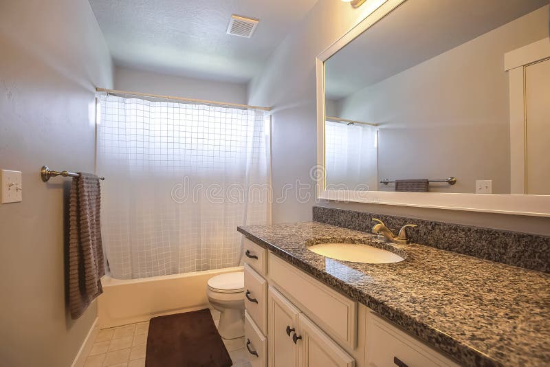 Toilet And Vanity With And Sink Undermounted On The White
