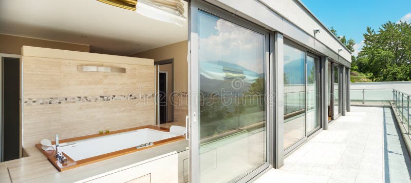 Bathroom with jacuzzi from the terrace stock image