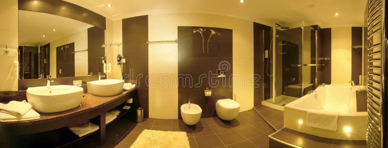A wide angle view of a large and beautiful, luxury bathroom. A wide angle view of a large and beautiful, luxury bathroom.