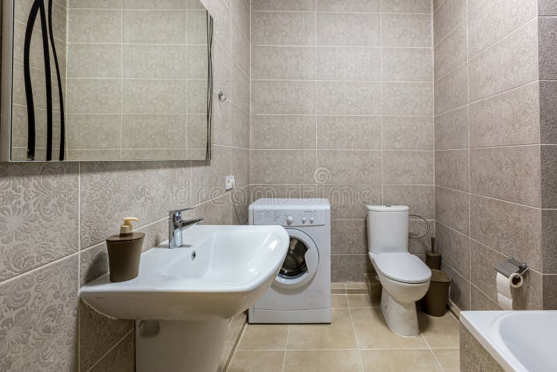 Bathroom with Shower, Bathtub and Light Tiles Stock Image Image of