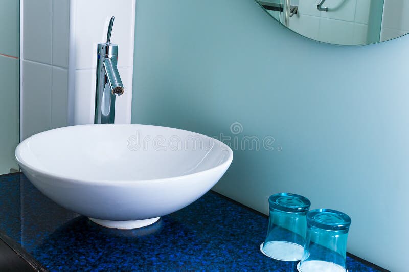 Bathroom sink counter tap mixer glass blue stock photos Bathroom sink counter tap mixer glass blue stock photos