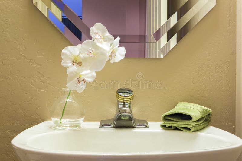 bathroom sink with flowers