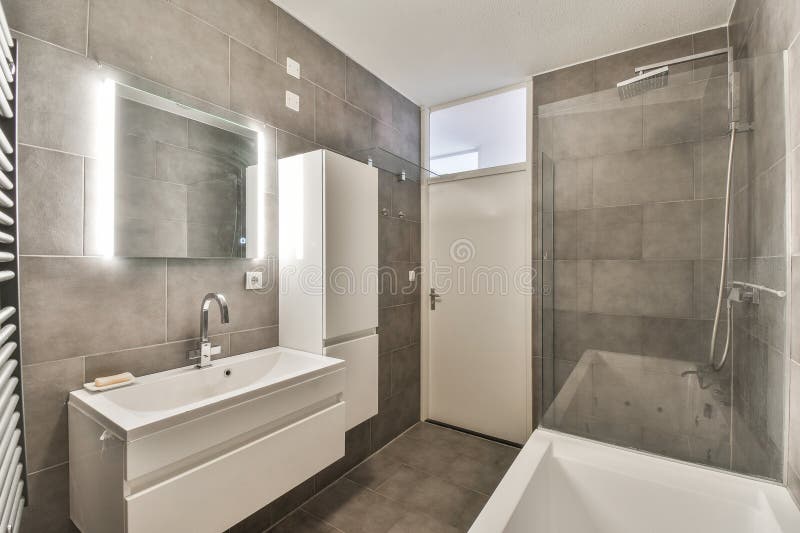 A Bathroom with a Sink and a Shower Stock Photo Image of bathroom