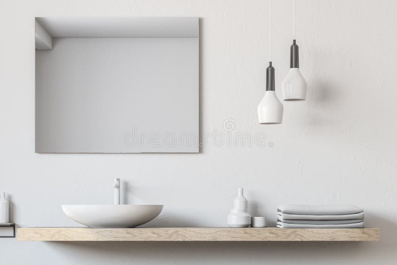 Bathroom sink, square mirror close up