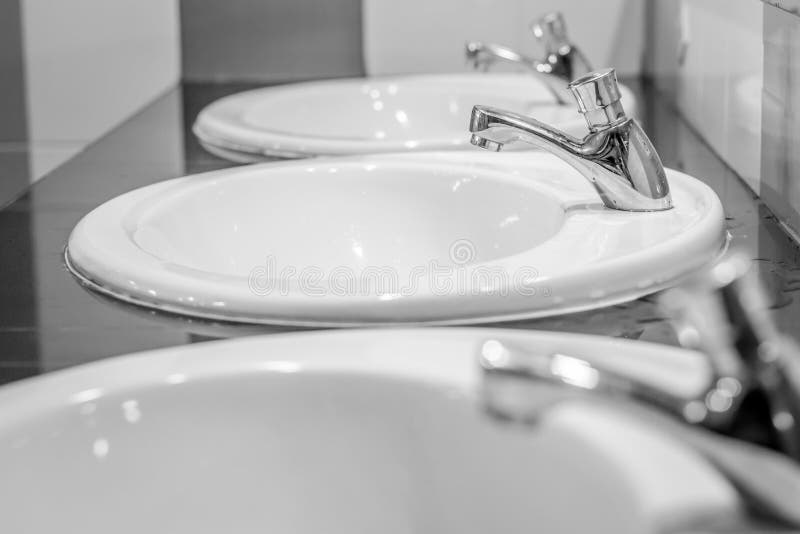 Bathroom sinks stock image. Image of private, classy 76820047