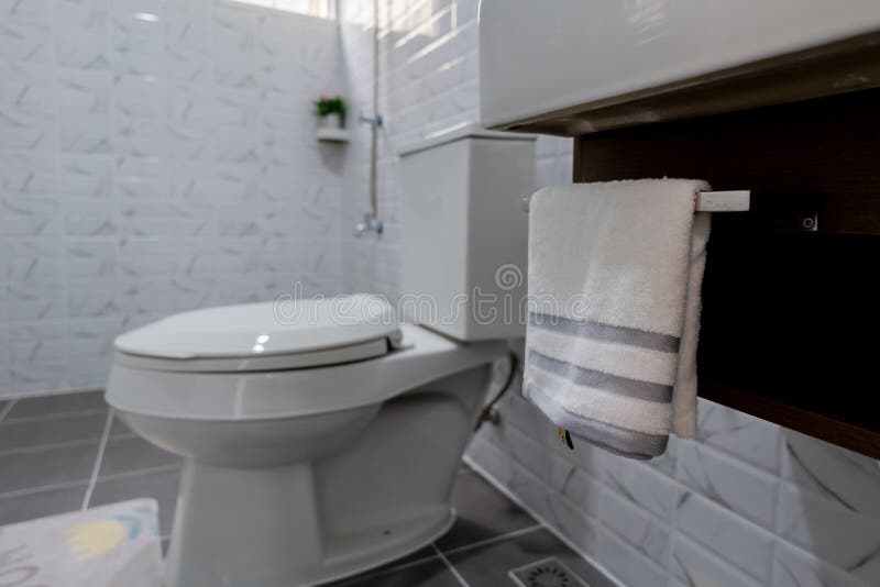 In the Bathroom There is a Dirty Ventilation Grate Covered with a Large