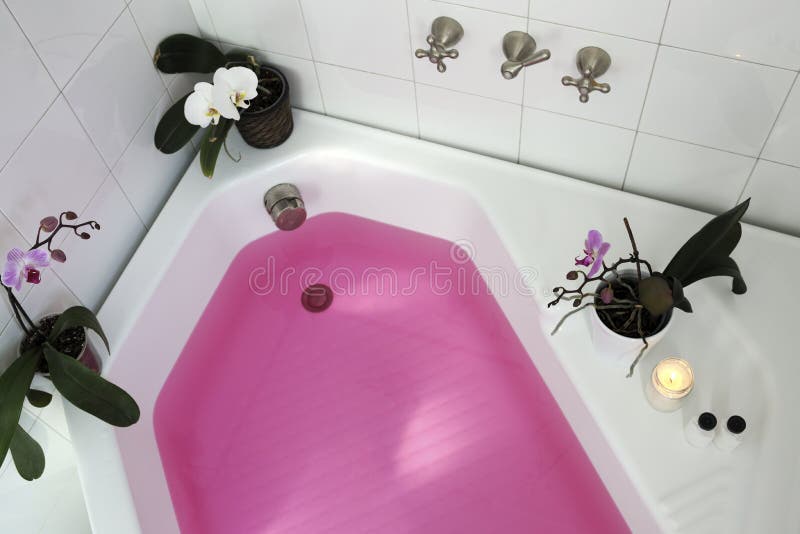 Bathtub with pink water stock photo. Image of bathtub 120785702