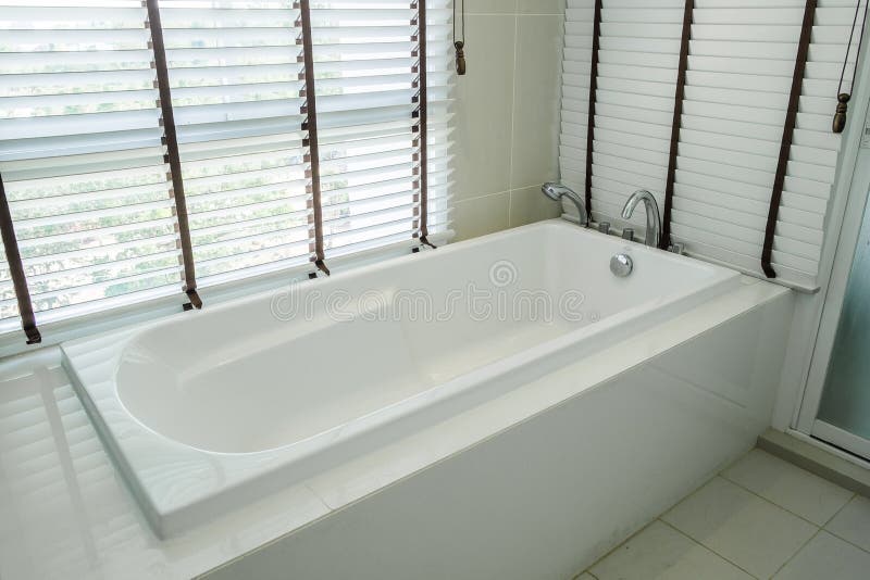 Bathtub White Ceramic and Wood Texture Interior Luxury Stock Photo