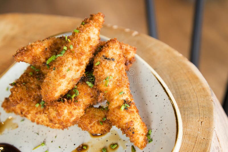 Battered Chicken Fingers in Spain. Stock Image Image of crispy
