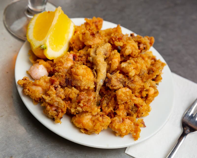 Battered Fried Baby Squid with Lemon Stock Photo Image of breaded