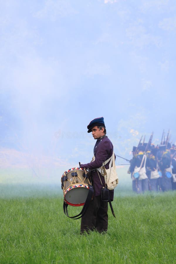 Medieval drummer playing his drum on the battlefield during the event bathmen spant de kroon in the dutch city bathmen. Taken on 01-06-2014. Medieval drummer playing his drum on the battlefield during the event bathmen spant de kroon in the dutch city bathmen. Taken on 01-06-2014.