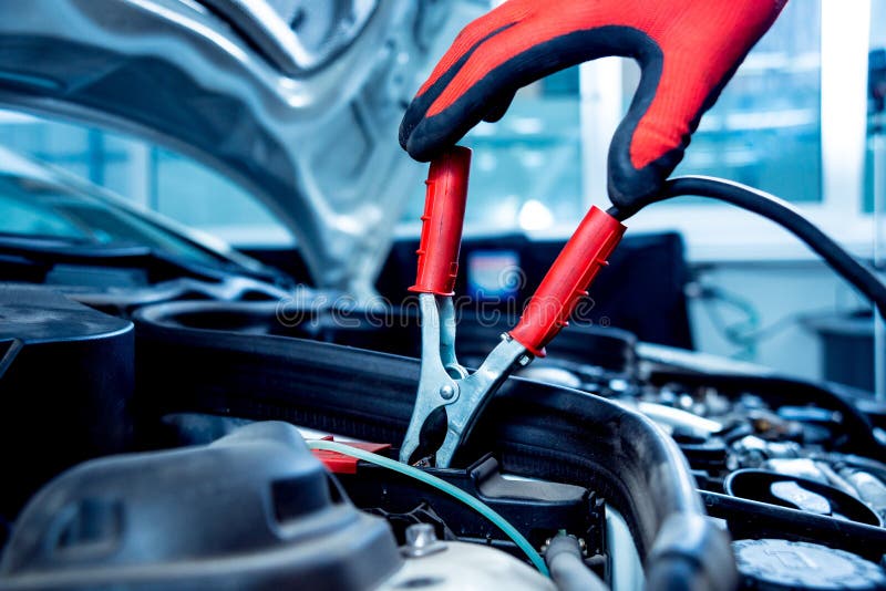 Battery Recharging. Battery Charge. Plus and Minus Terminals on the