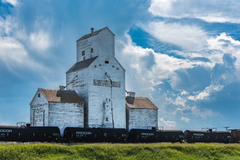 Battrum, SK/Canada- July 23, 2019: Storm clouds around the vintage grain elevator in Battrum, Saskatchewan