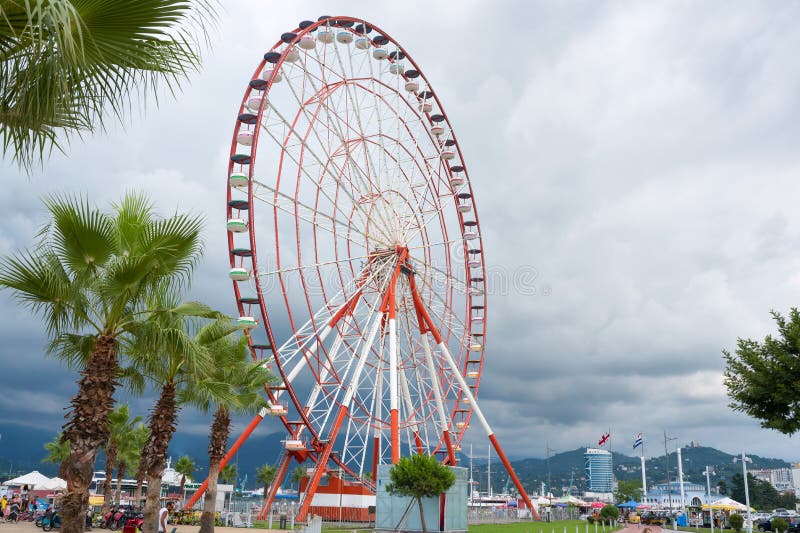 Batumi, Adjara, Georgia - August 06, 2018: The Ferris wheel on the embankment of Batumi. Close-up stock photography Batumi, Adjara, Georgia - August 06, 2018: The Ferris wheel on the embankment of Batumi. Close-up stock photography