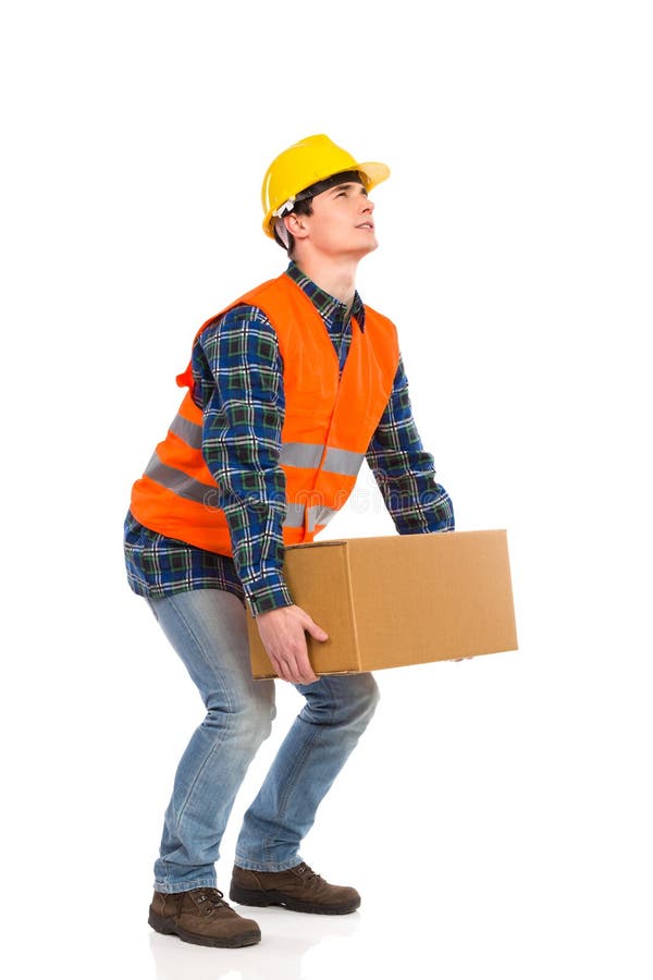 Bauarbeiter, der schweren Kasten aufhebt. lizenzfreie stockbilder Bauarbeiter, der schweren Kasten aufhebt. lizenzfreie stockbilder
