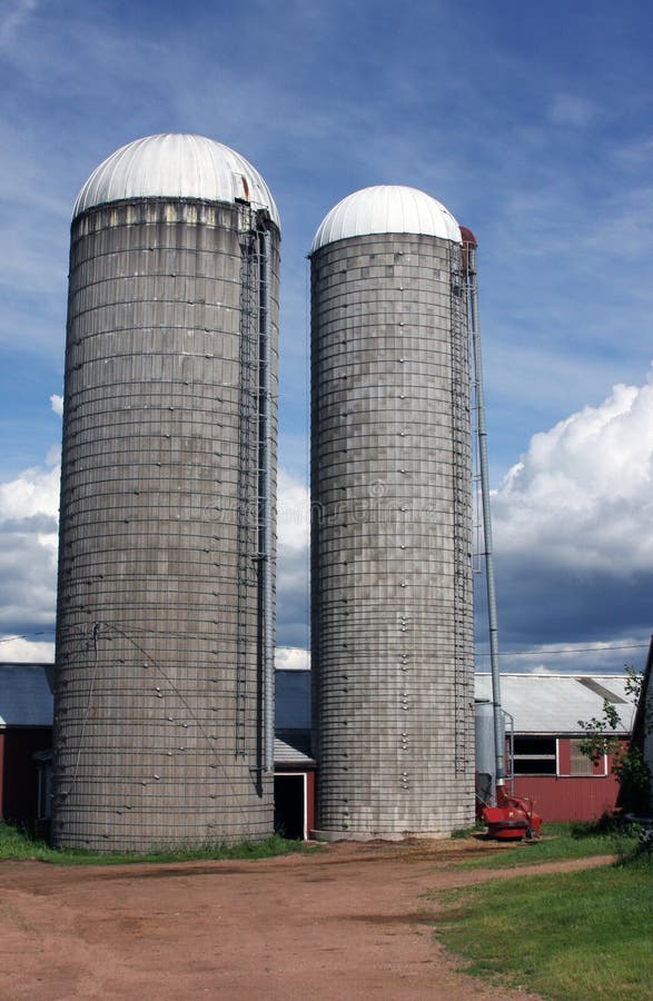 Twin silos on traditional Wisconsin dairy farm. Twin silos on traditional Wisconsin dairy farm