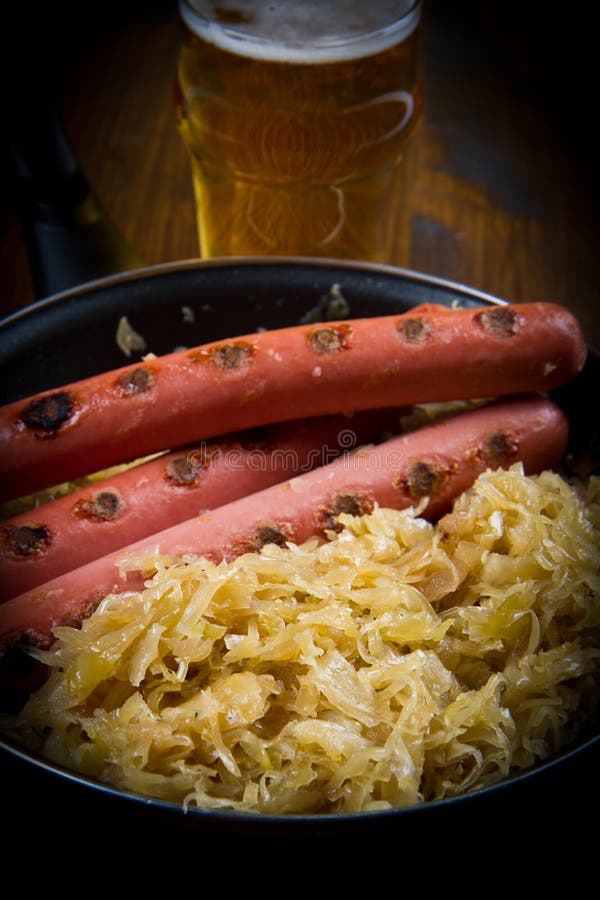 Bavarian Fried Sausages on Sauerkraut Stock Photo Image of dinner