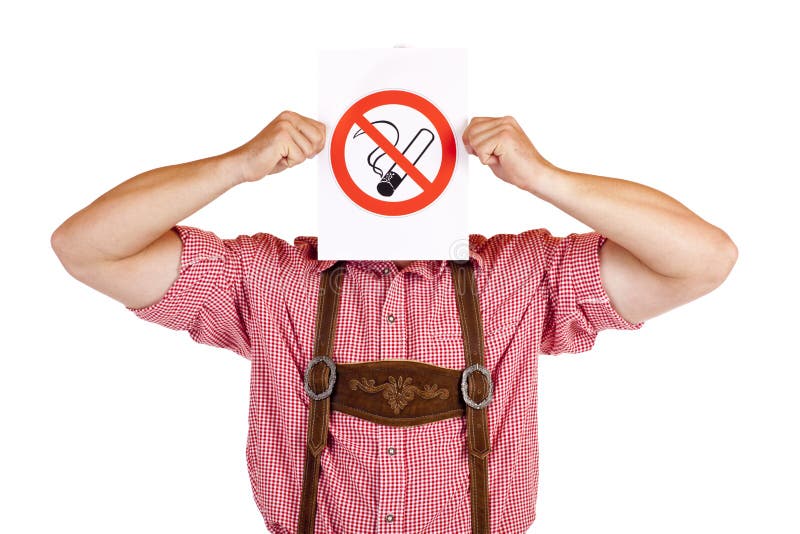 Bavarian man holds no-smoking-rule sign