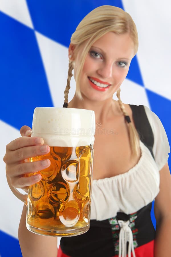 Bavarian Waitress with Octoberfest Beer Looking Up Stock Image - Image ...