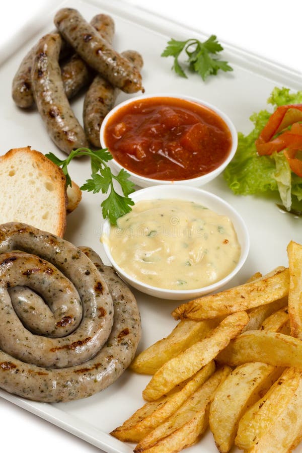 Bawarskie kiełbasy na grillu, francuz smażą zdjęcie royalty free Bawarskie kiełbasy na grillu, francuz smażą zdjęcie royalty free