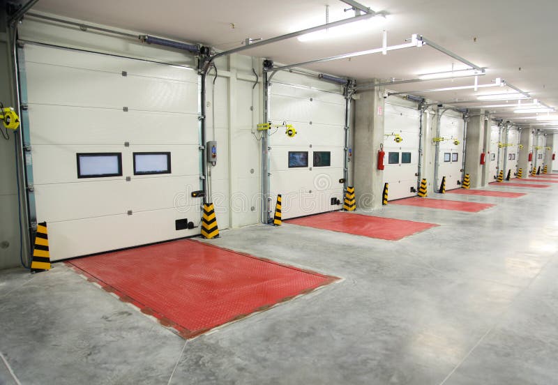 Truck docking bay inside in factory. Truck docking bay inside in factory