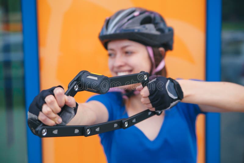Bicycle Lock. Bicycle Lock in the Hands of the Girl Stock Image Image