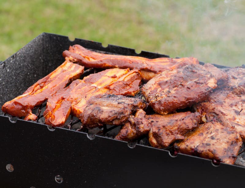 Bbq Ribs and Bacon on a Grill with Charcoal Stock Image Image of heat