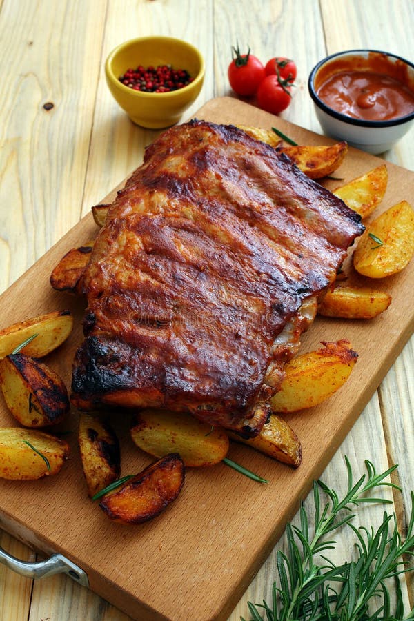 BBQ spare ribs with herbs stock photos BBQ spare ribs with herbs stock photos