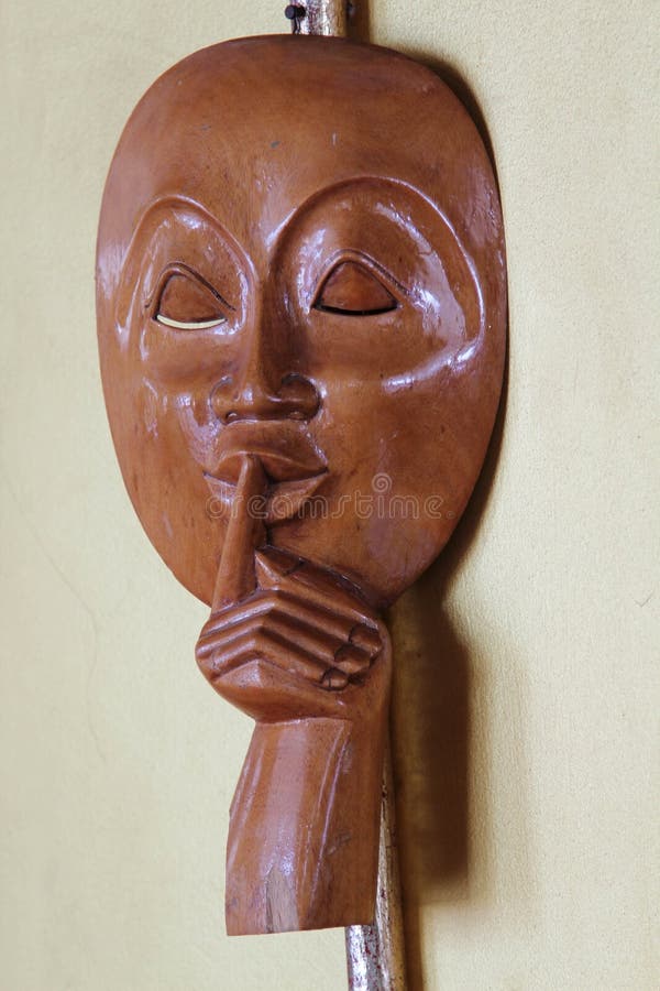 Man face wood carving on white background stock photography Man face wood carving on white background stock photography