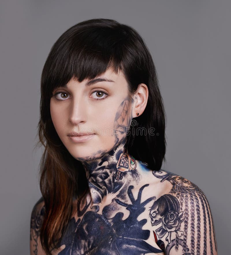 Be-you-tiful. a Cropped Studio Portrait of a Tattooed Young Woman ...
