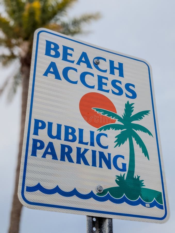 Beach access sign for free public parking in clearwater florida royalty free stock photo