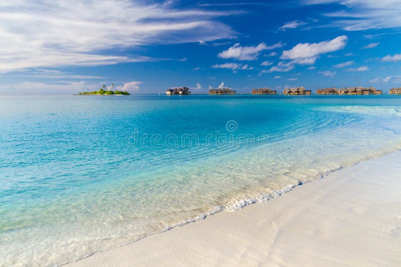 Beach background. Beautiful beach landscape. Tropical nature scene. Palm trees and blue sky. Summer holiday and vacation concept. Vacation holidays background royalty free stock photography Beach background. Beautiful beach landscape. Tropical nature scene. Palm trees and blue sky. Summer holiday and vacation concept. Vacation holidays background royalty free stock photography