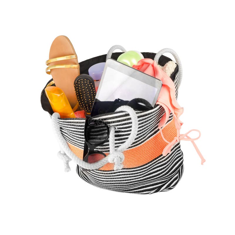 Beach bag with accessories stock image. Image of girly 43332127