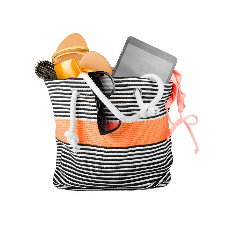Beach bag with accessories stock image. Image of girly 43332127
